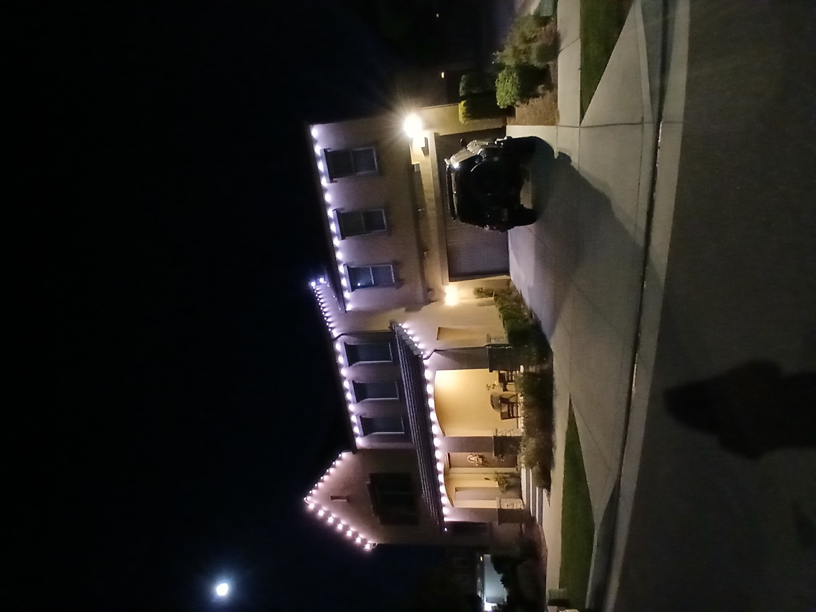 White permanent outdoor lighting installation