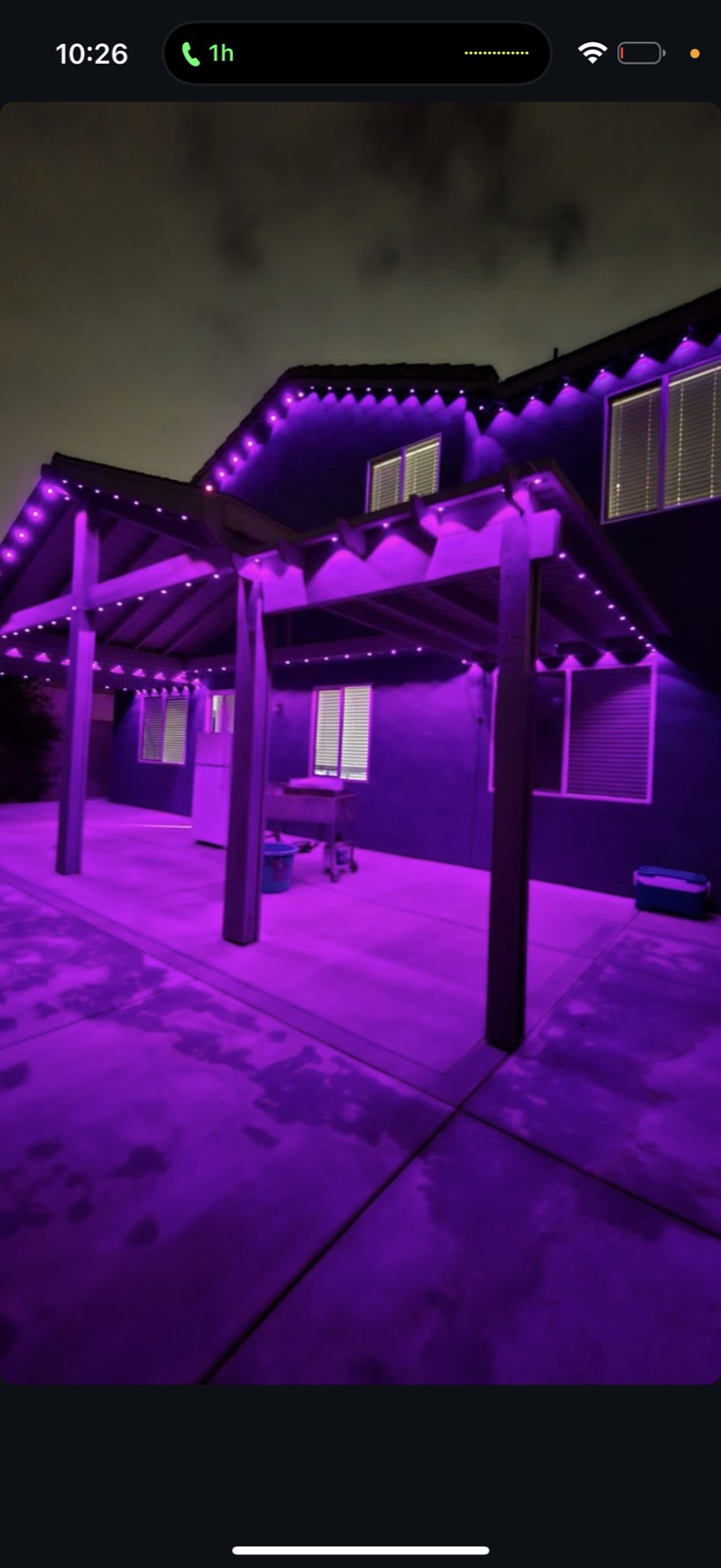 Purple permanent outdoor lighting installation